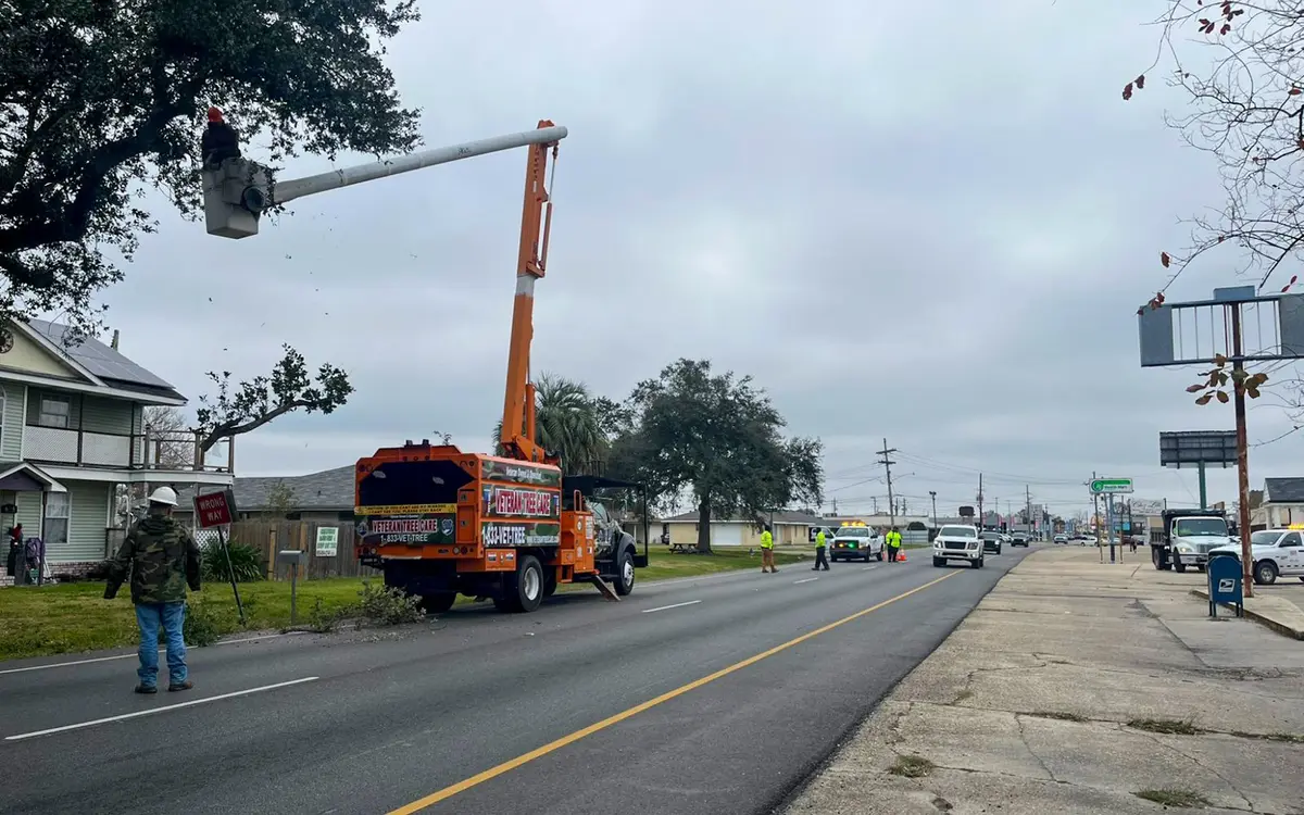 Veteran Tree Care bucket truck at a roadside job